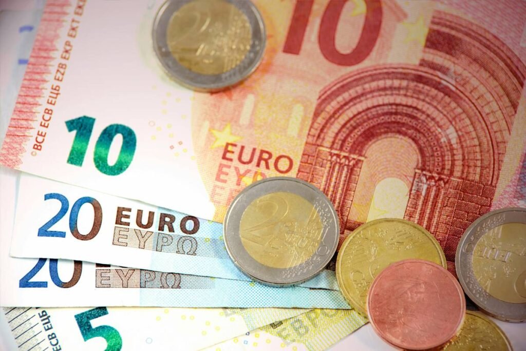 Euro notes and coins - Photo by Pixabay